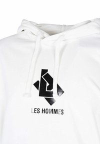 Sudadera blanca con un logo gráfico negro y el texto "LES HOMMES" en la parte frontal. Cuenta con cordones y un diseño clásico de tipo pullover.