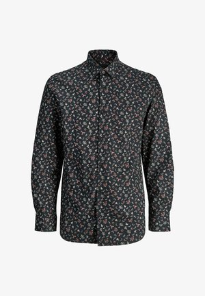 Chemise à manches longues, boutonnée, en tissu sombre avec un motif floral rouge et blanc. Elle présente un col classique et une coupe régulière.