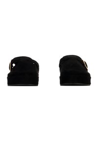 Black suede platform slides with a wide strap featuring a metallic buckle detail. The shoes have a smooth texture and a rounded shape.