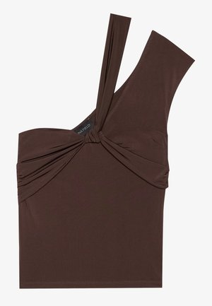 Brun en-skulder topp laget av myk stoff. Har vridd knute detalj foran og en asymmetrisk stroppdesign. Glatt tekstur.