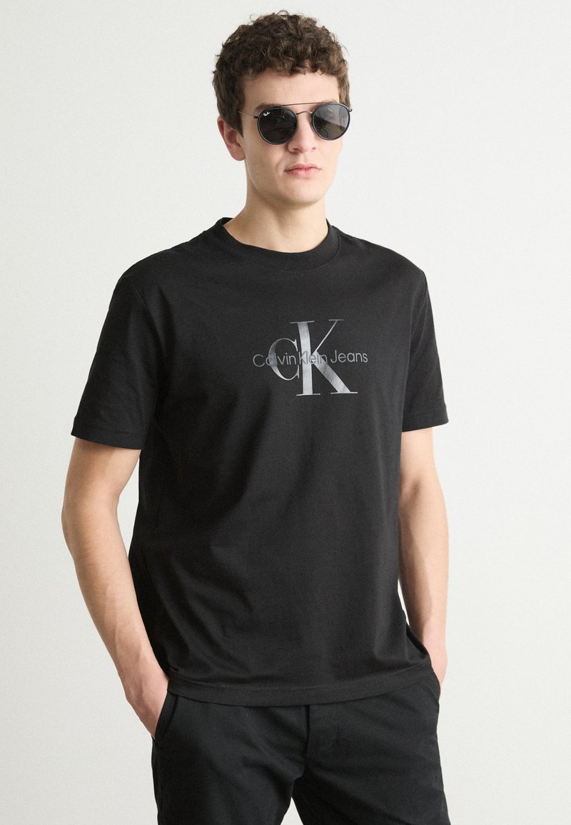 Calvin Klein Jeans - SHINY MONOLOGO TEE - Print T-shirt - black, Enlarge