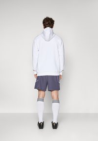 adidas Performance MANCHESTER UNITED UBP SHORT - Roupa de discoteca - trace purple