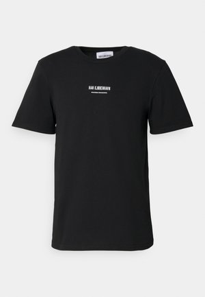 Black cotton t-shirt with short sleeves and a round neckline. Features white printed text on the front. Simple design, no additional patterns.