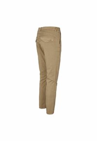 Beige, taps toelopende broek van katoen, met een gladde textuur, twee achterzakken en een subtiel logo op de tailleband.