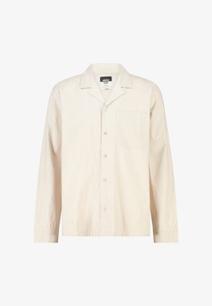 Beige overhemd met lange mouwen, knopen, borstzak en een spreadkraag, label met de tekst "America Today."