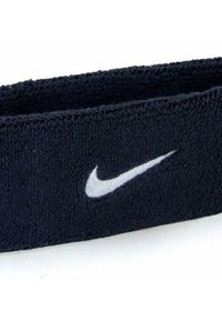 Fascia sportiva in cotone blu navy con logo Nike ricamato bianco, tessuto texturizzato e design largo ed elastico per una vestibilità sicura.