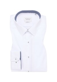 Weißes, super slim fit Hemd mit klassischem Kragen. Auffällige marineblaue Musterakzente am inneren Kragen und an den Manschetten, mit Knopfverschluss.