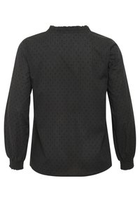 Blouse noire à manches longues avec un motif texturé, dotée d'un col volants et de poignets élastiqués. Tissu lisse avec un éclat subtil.