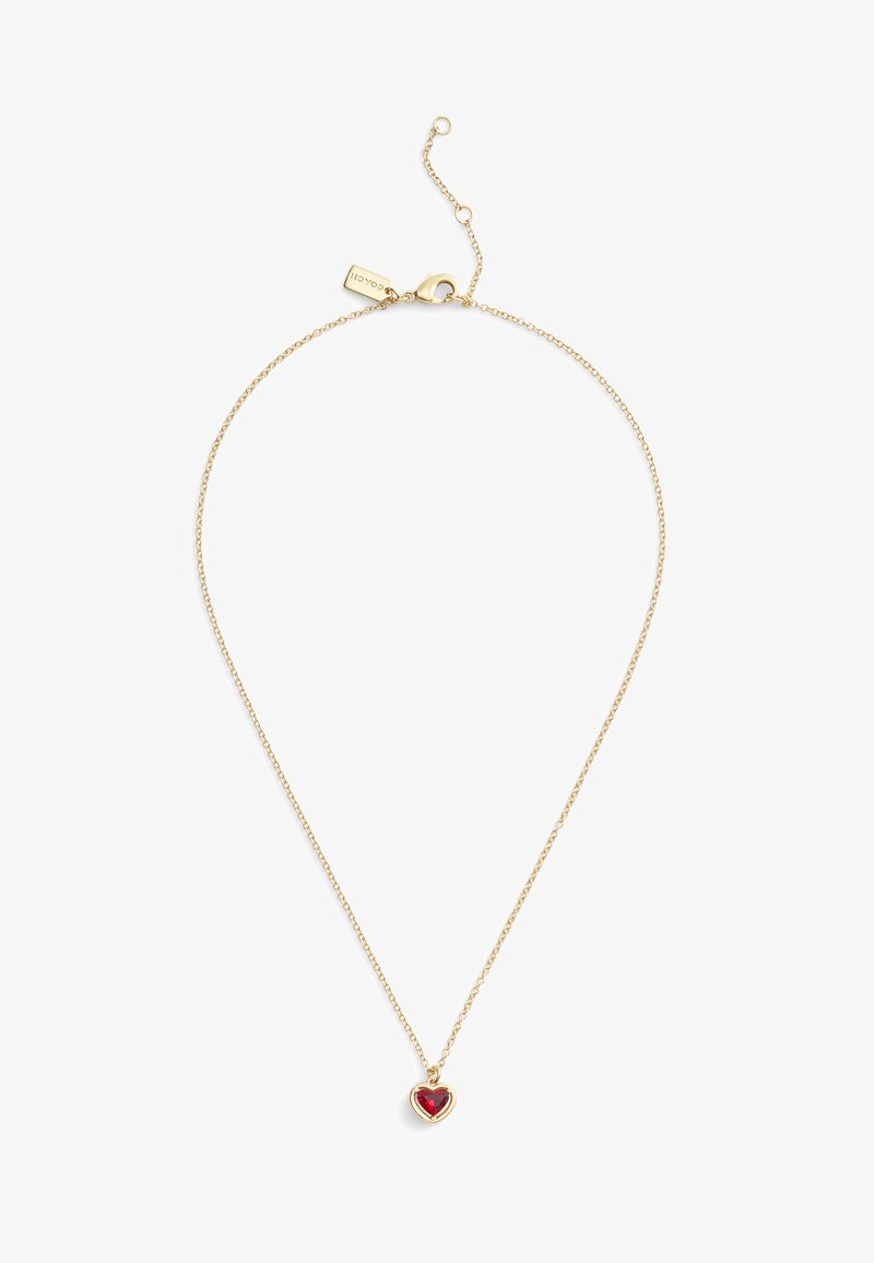 Gold chain necklace featuring a heart-shaped pendant with a red gemstone. Delicate links and a lobster clasp closure.