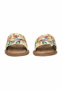 Sandales à glissière brodées présentant une tige en tissu beige doux avec des motifs floraux en rose, orange et vert, et une semelle texturée marron.