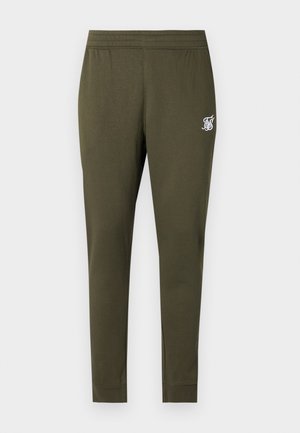 Olive green joggers with a fitted design, elastic waistband, and a small white logo detail on the upper left leg. Soft fabric texture.