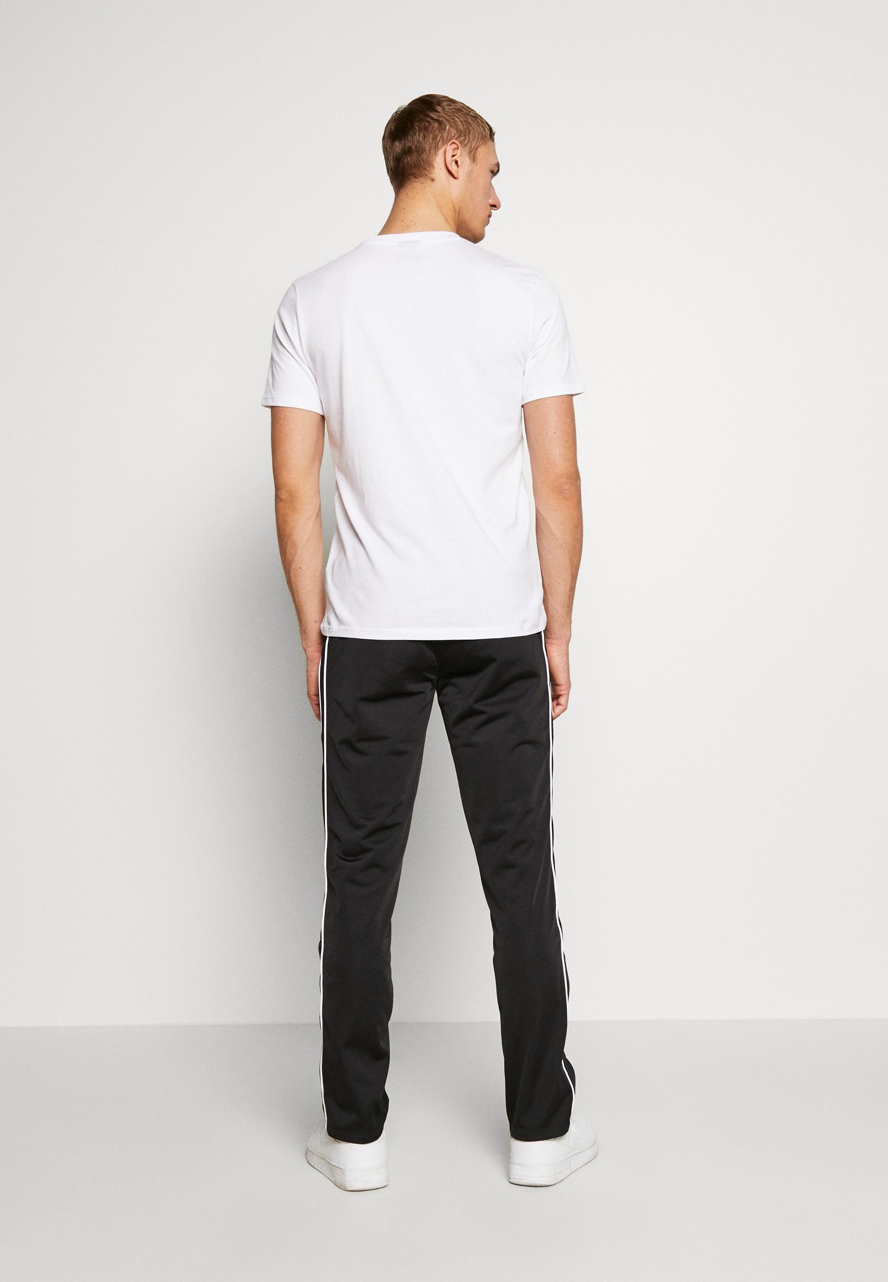 Umbro DIAMOND TRACK PANT Joggebukse blackbrilliant Umbro DIAMOND TRACK PANT Joggebukse blackbrilliant