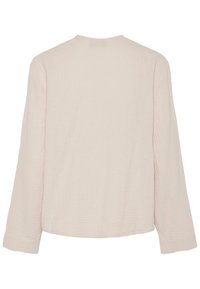 Blusa a maniche lunghe di un leggero beige, con un tessuto testurizzato caratterizzato da un sottile motivo stropicciato e un collo rotondo. Vista posteriore solo.