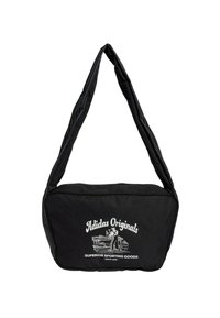 Čierna ramenná taška vyrobená z látky s hladkou textúrou. Má veľké predné logo v bielej farbe. Disponuje jedným širokým popruhom na nosenie.