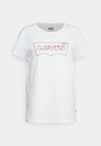 Vit bomull t-shirt med korta ärmar, med en rosa Levi's logotypgrafik framtill, rund halsringning och rak fåll.