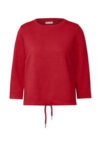 Röd långärmad sweatshirt med rund halsringning och dragsko i nederkanten. Tillverkad av mjukt material och har en avslappnad passform.