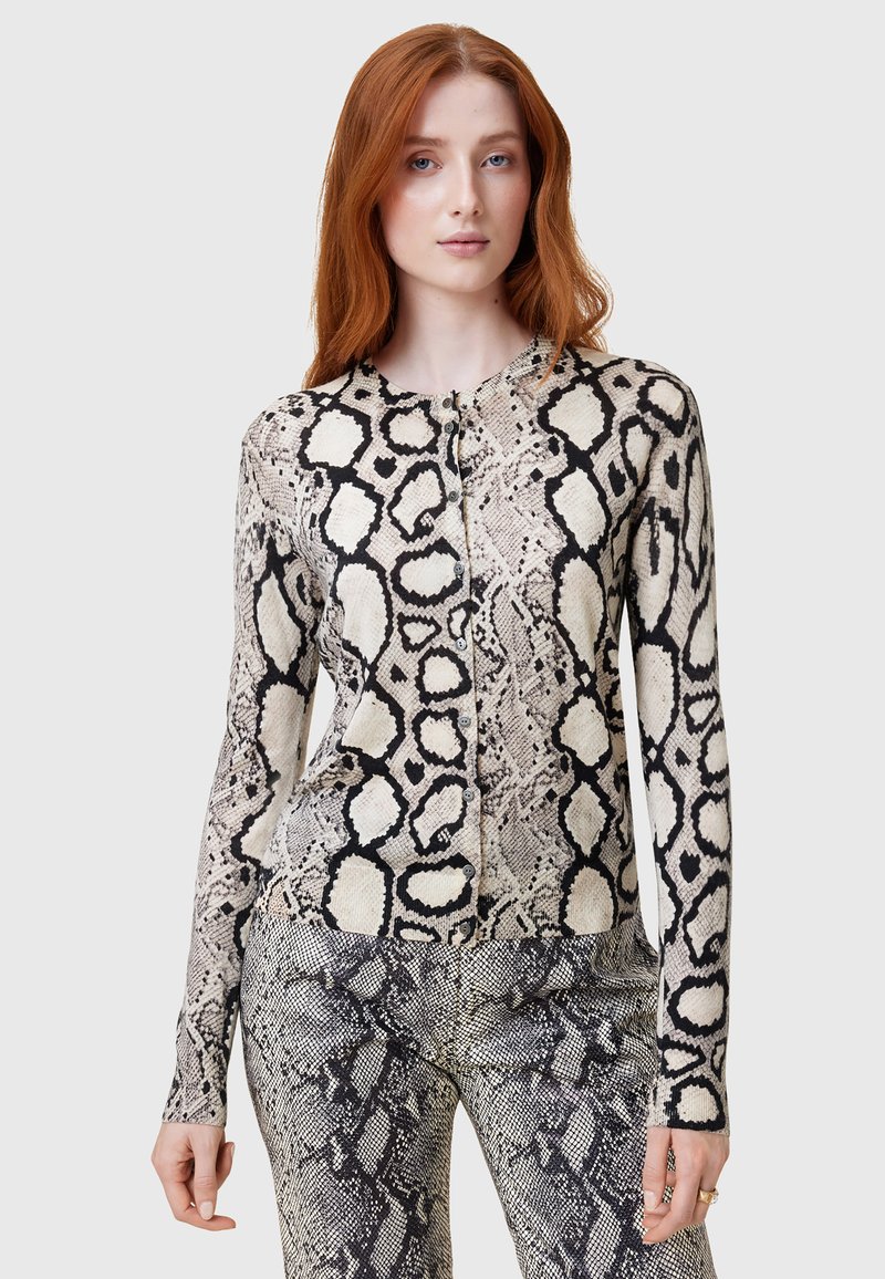 Cardigan a maniche lunghe con un design a stampa serpente nero e crema, con scollatura rotonda e chiusura con bottoni sulla parte anteriore.