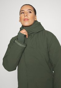 Houdini FALL IN PARKA - Parka - baremark green