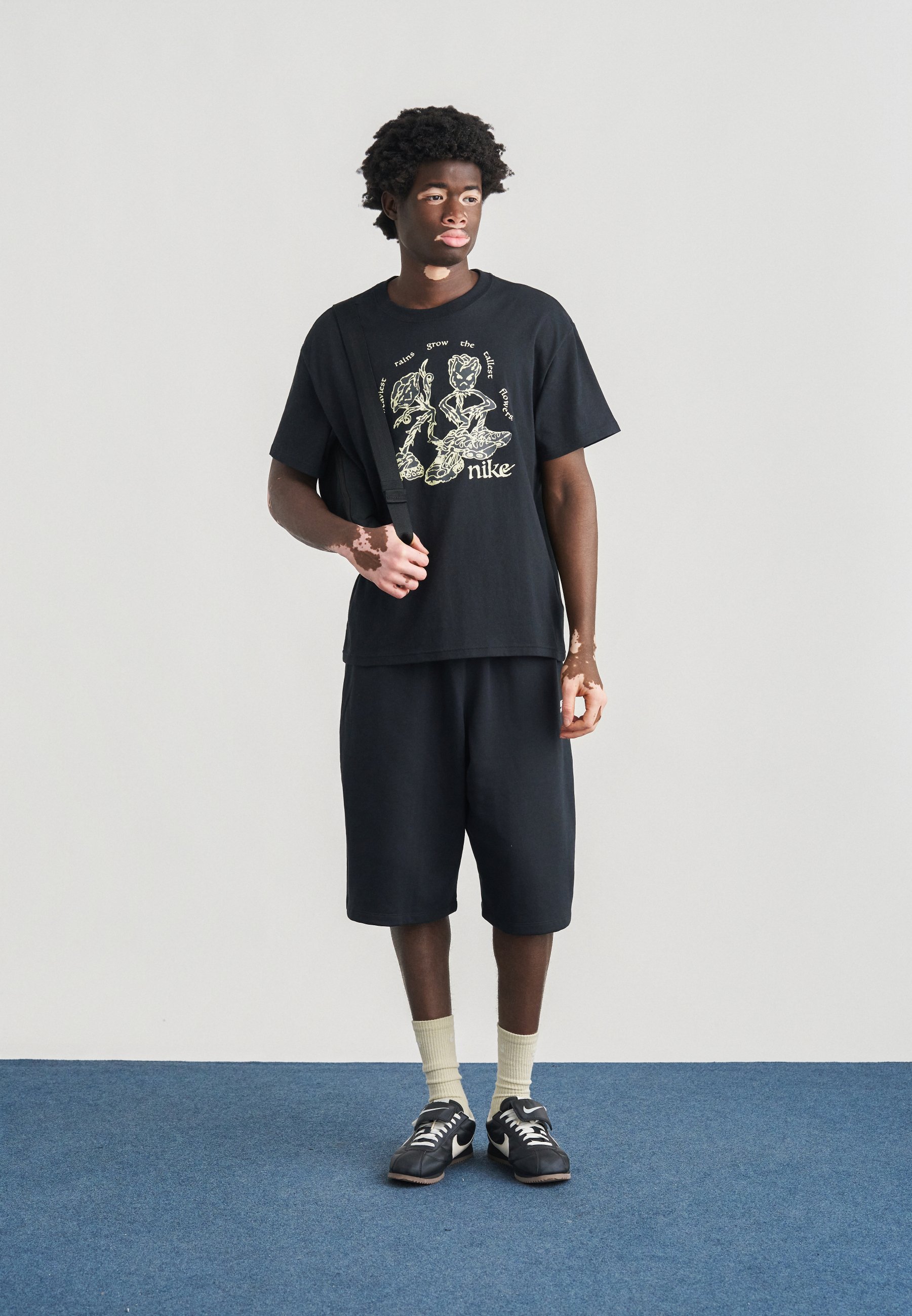 Nike Sportswear TEE TALL FLOWERS - Print T-shirt - black - Zalando.ie