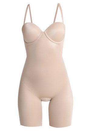 Beige bodysuit met gevormde cups, dunne verstelbare straps, een zachte textuur en een lengte tot halverwege de dij, met een naadloos ontwerp.