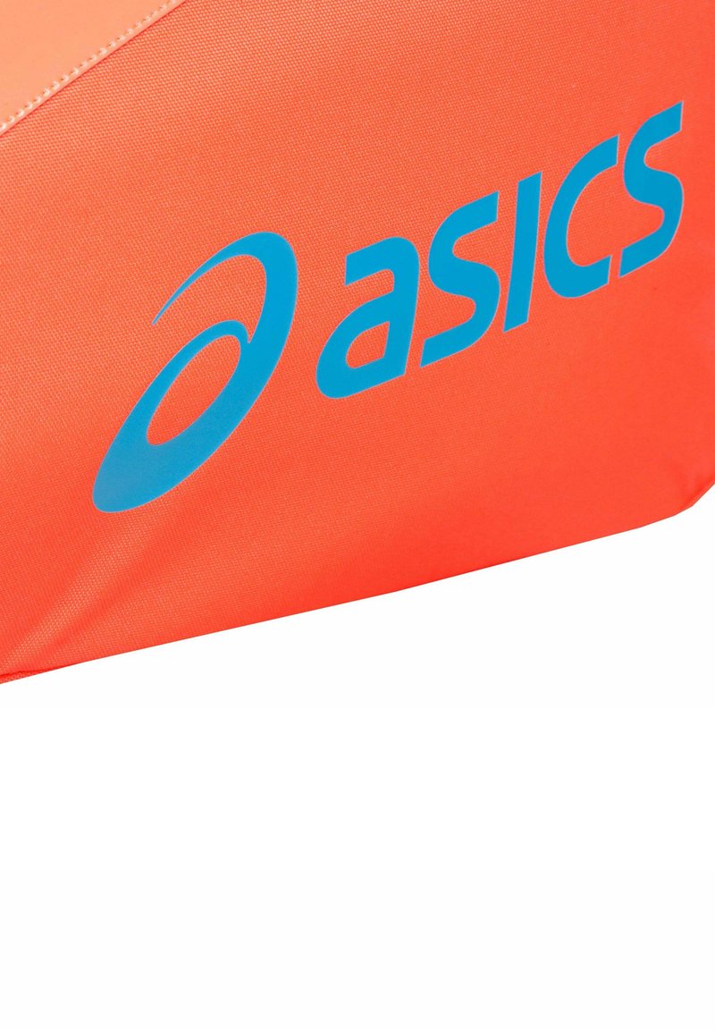 Blue ASICS logo on bright orange textured fabric, likely part of a sports accessory or clothing item.