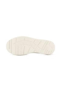 Semelle de chaussure en caoutchouc blanc avec un motif de grip texturé, comprenant des lignes horizontales et verticales, ainsi qu'un logo distinct près du talon.