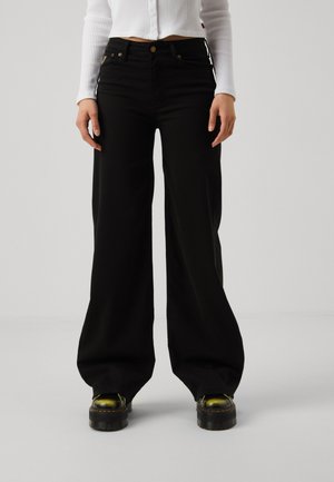 PALAZZO - Flared jeans - black