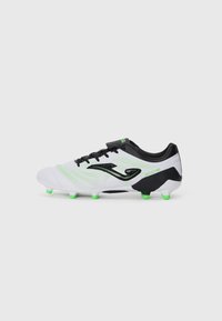 White football boots with green accents, black details, and textured mesh upper. Features six green studs and a sleek design.