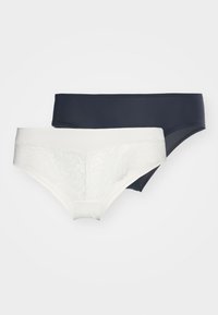 Two pairs of women’s underwear: one white with lace detailing and one solid navy. Both feature a seamless design and soft fabric.