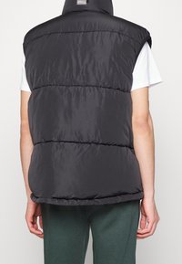 Sixth June Smanicato - black
