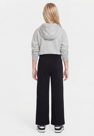 Nike Sportswear, STUDIO PANT - Pantalones deportivos - black/white