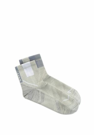 Pair of ankle-length socks in light gray with white and darker gray geometric patterns and ribbed cuffs.