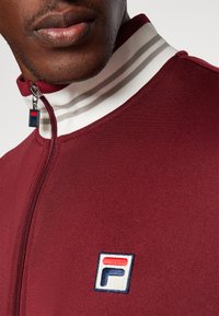 Fila JACKET BJÖRN - Treningsjakke - cabernet/white alyssum