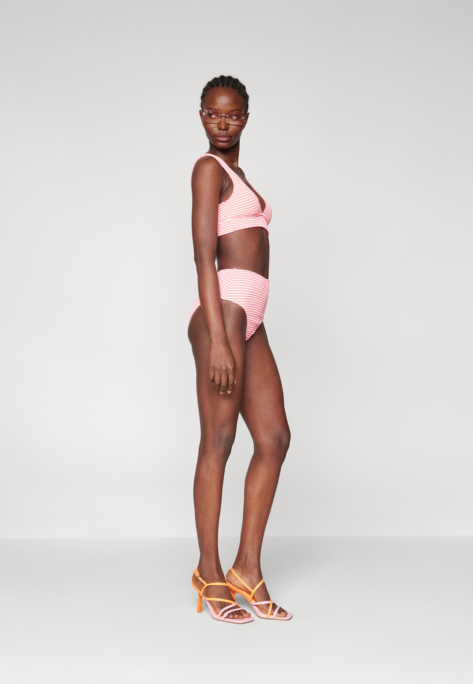 longline bikini top and high waisted bottoms