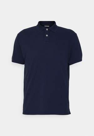 Polo shirt navy en coton, avec un col classique, patte de boutonnage à trois boutons et logo brodé sur la poitrine. Manches courtes.