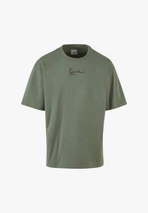 Khaki zelené bavlněné tričko s krátkými rukávy, kulatým výstřihem a vyšitým logem na hrudi. Hladký materiál, volný střih.