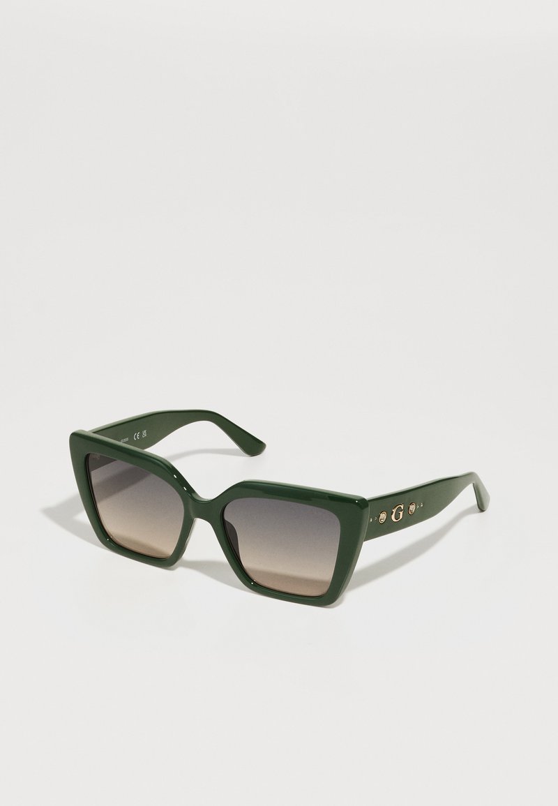 Guess Sonnenbrille - shiny dark green/gradient smoke