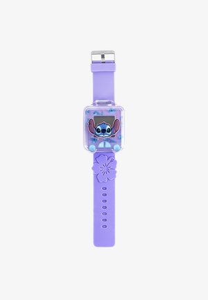 Montre en caoutchouc violette avec un boîtier transparent présentant un design de dessin animé. Comprend un accent floral sur le bracelet et des boutons ronds pour le réglage.