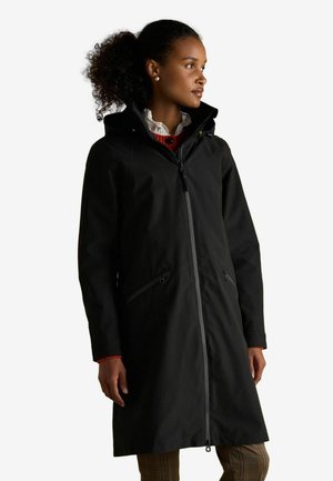 Schwarze wasserdichte Jacke mit Kapuze, Reißverschluss, zwei Fronttaschen und lockerer Passform. Verfügt über einen kontrastierenden Reißverschluss und verstellbare Manschetten.