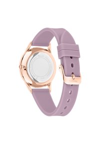 Runde Uhr mit einem Gehäuse aus roségoldfarbigem Edelstahl, klarem Rückbereich und einem helllila Silikonarmband mit metallischem Verschluss und Löchern.