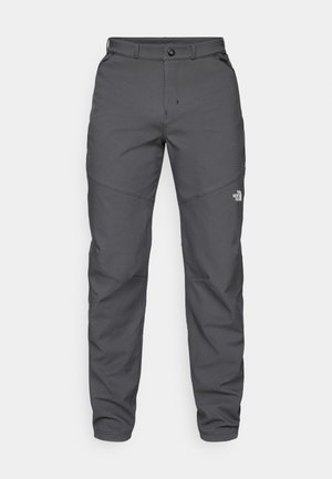 Pantalons d'extérieur gris en tissu durable, avec fermeture à bouton, passants de ceinture et un logo près de la jambe inférieure.