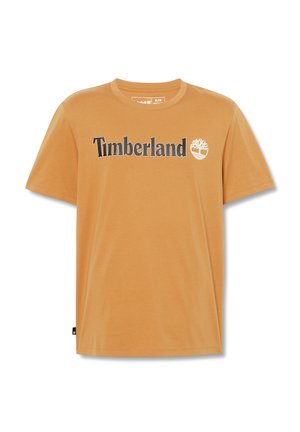 Oranje katoenen t-shirt met het "Timberland" logo in het zwart, met een witte boomicoon. Korte mouwen en ronde hals. Glad textuur.