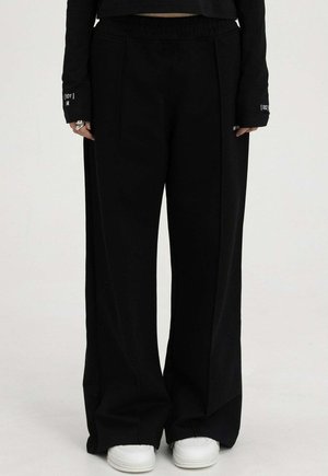 CREASE WIDE-LEG - Tracksuit bottoms - black