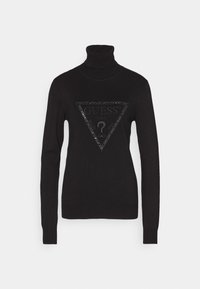 Maglione nero a collo alto con maniche lunghe e un logo triangolare nero con il testo "GUESS" e un punto interrogativo al centro.