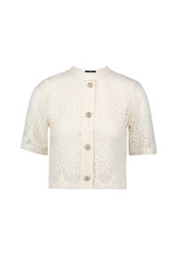 Cardigan all'uncinetto a maniche corte in bianco sporco, con scollatura rotonda e cinque bottoni decorativi al centro. Motivo in pizzo testurizzato.