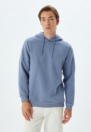 Hooded sweatshirt in light blue. Soft fabric, long sleeves, drawstring at the neck, ribbed cuffs and hem. Minimalistic design, no patterns.