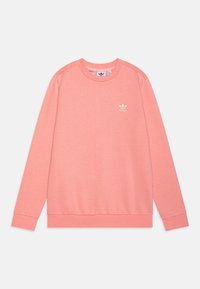 Rosa sweatshirt gjord av mjukt tyg, med rund halsringning, långa ärmar och en liten vit logotyp på bröstet. Slät textur.