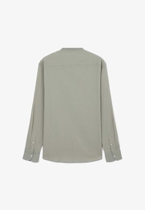 Langärmeliges Hemd aus hellgrünem Stoff mit abgerundetem Saum, knöpfbaren Manschetten und rückwärtigem Passe für Struktur. Glatte Textur.