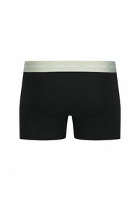 Fekete boxer alsónadrág, puha anyagból. Világoszöld gumírozott derékkal rendelkezik, amelyen fehér színnel a "JACK & JONES" márkaneve szerepel.