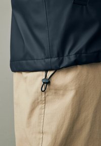 Next RUBBERISED HOODED-REGULAR FIT - Jachetă impermeabilă - navy blue